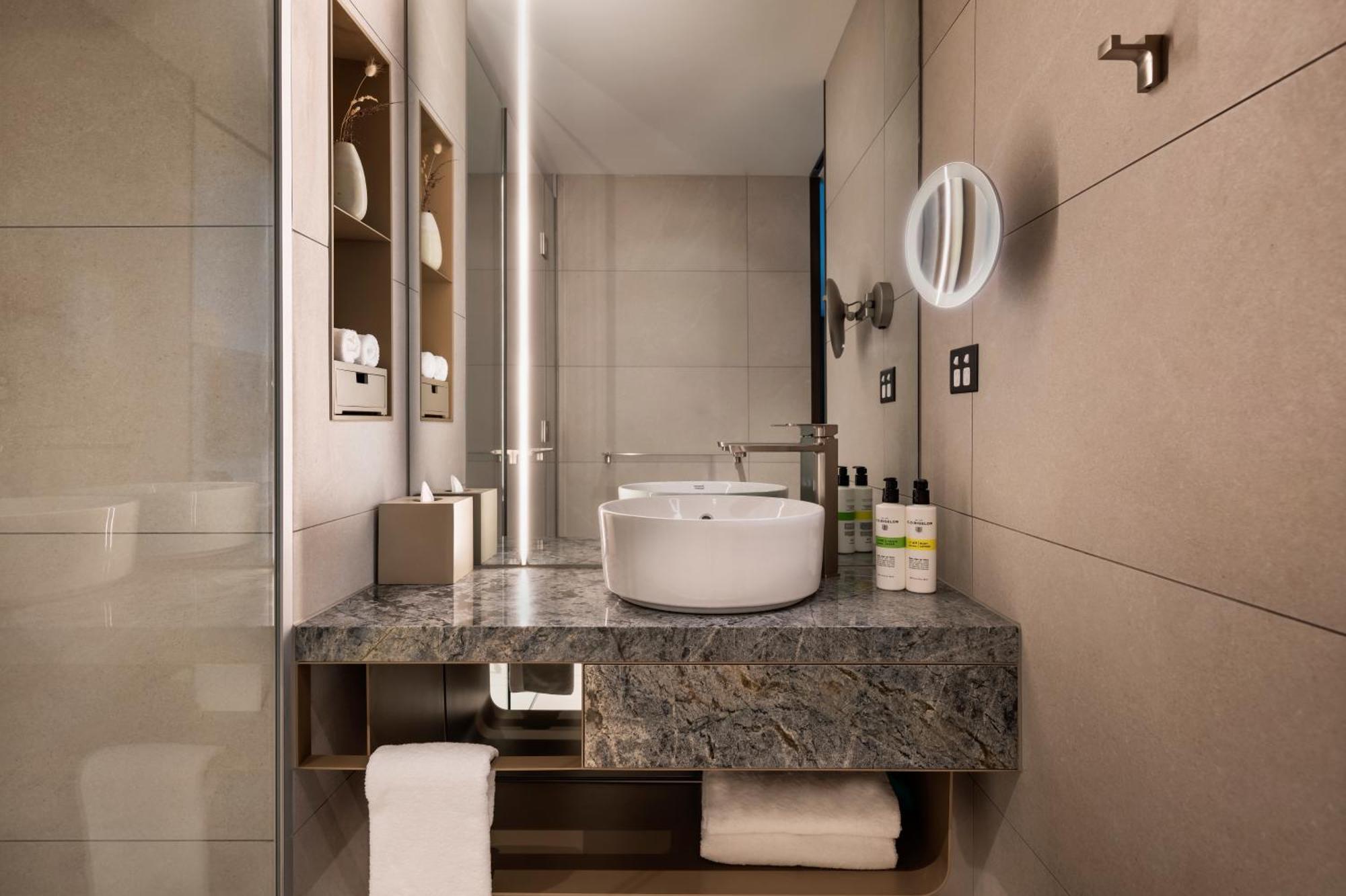 Отель Pullman Auckland Airport Экстерьер фото Bathroom